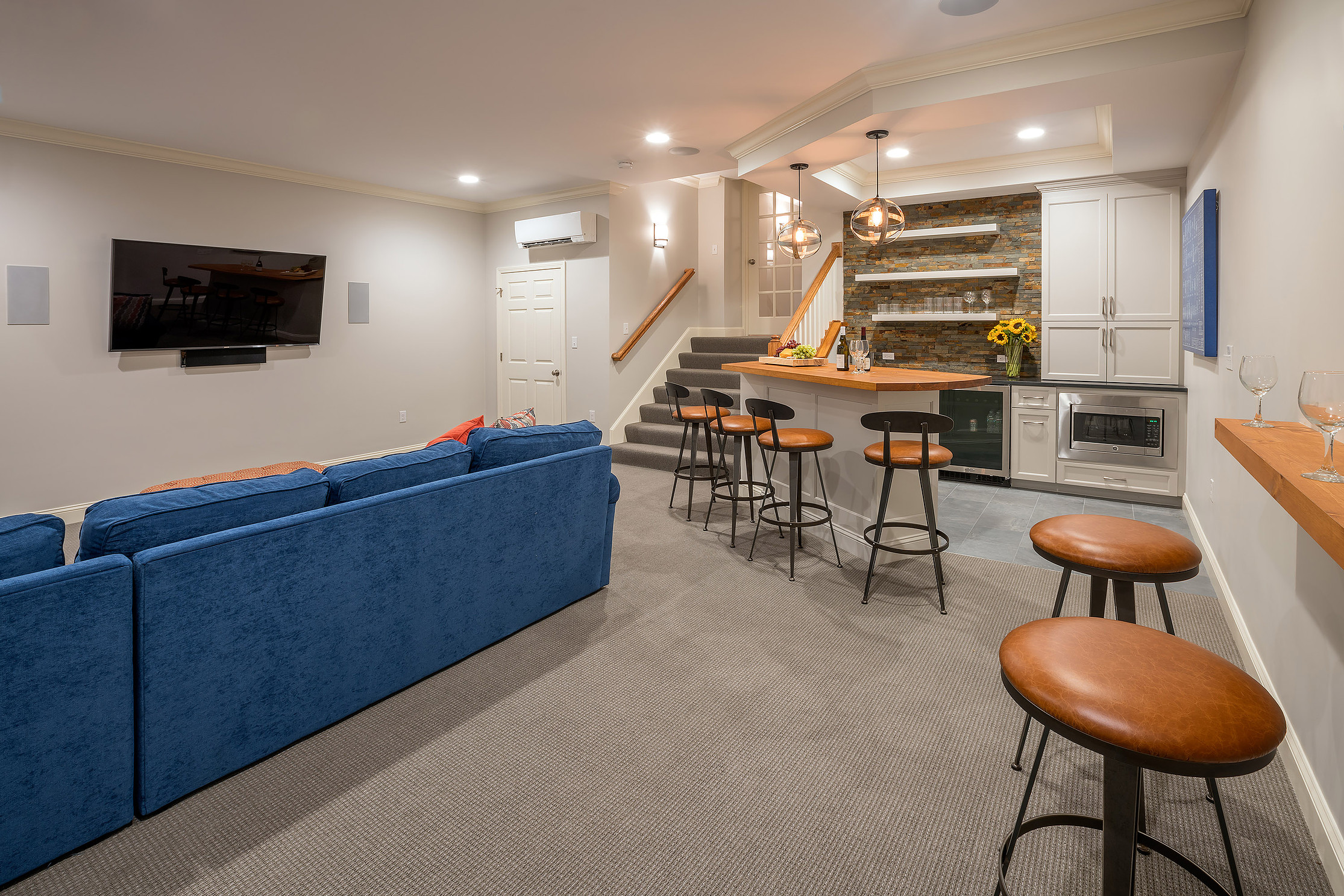 basement bar and couch in medfield, massachusetts