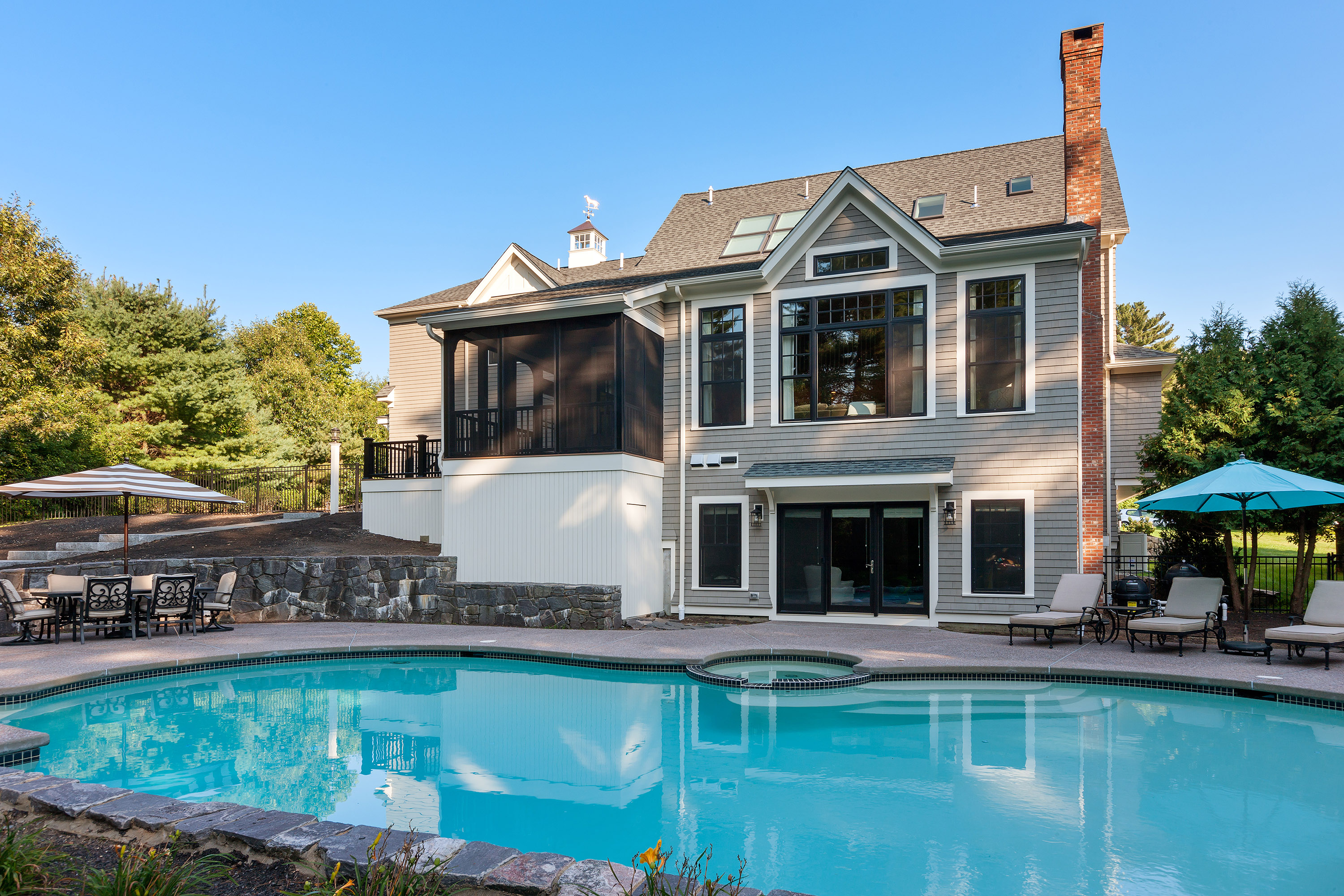 This house is great as they have not only a porch & screened in porch, but a patio area as well, allowing for multiple seating areas to sit and enjoy a beautiful summer day.