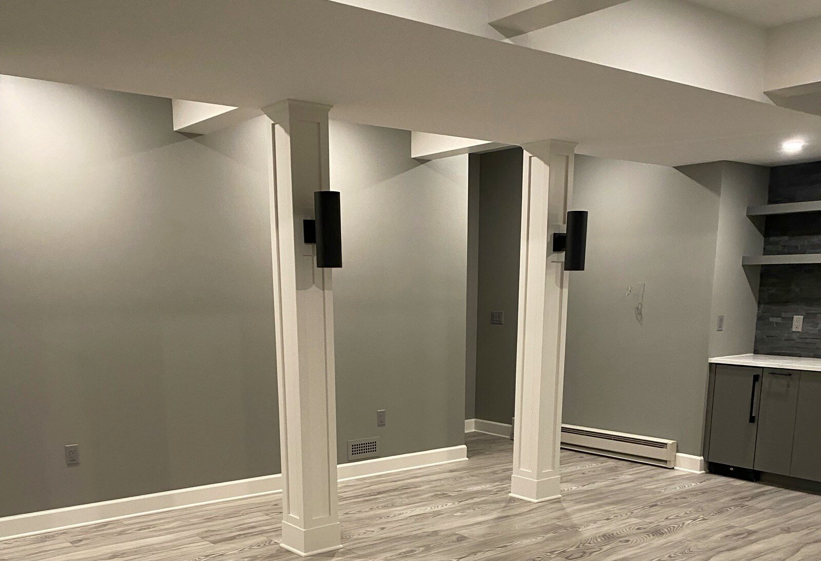 Lighting and Ceiling Height Solutions for a Bright, Spacious Basement